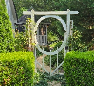 antique wooden door accent in garden